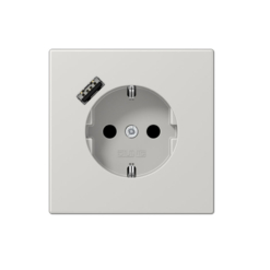 Enchufe Schuko con cargador USB tipo A en gris claro jung LS 990. Ref: LS1520-18ALG
